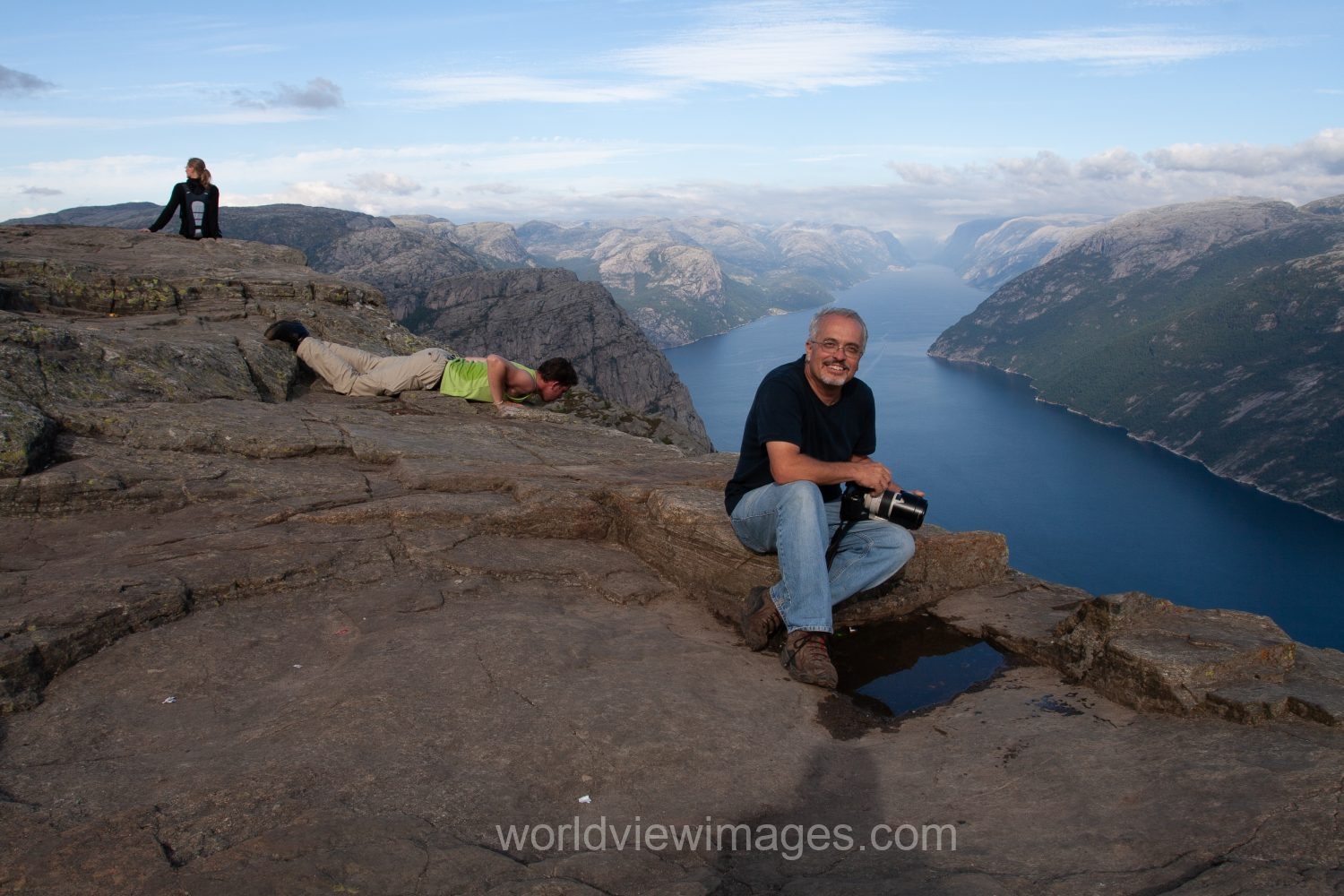 Photographer on Pulpit Rock in Norway