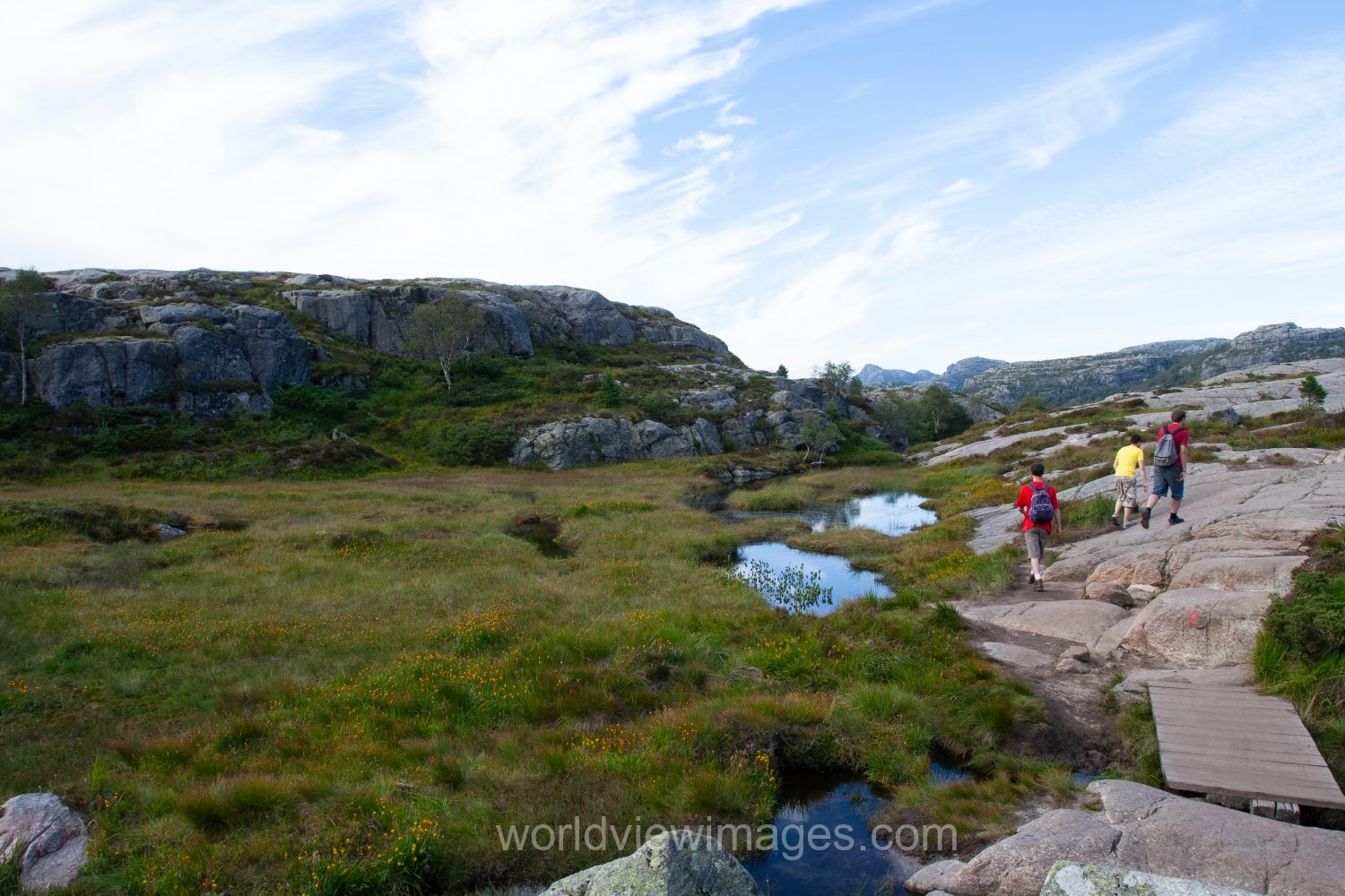 People hiking up to Pulpit Rock