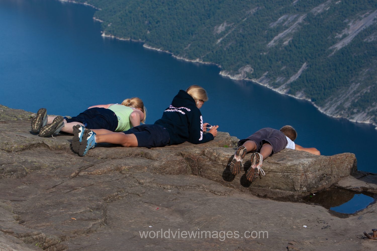 Children Take in the scene of the magnificent fjords= below Pulpit Rock in Norway
