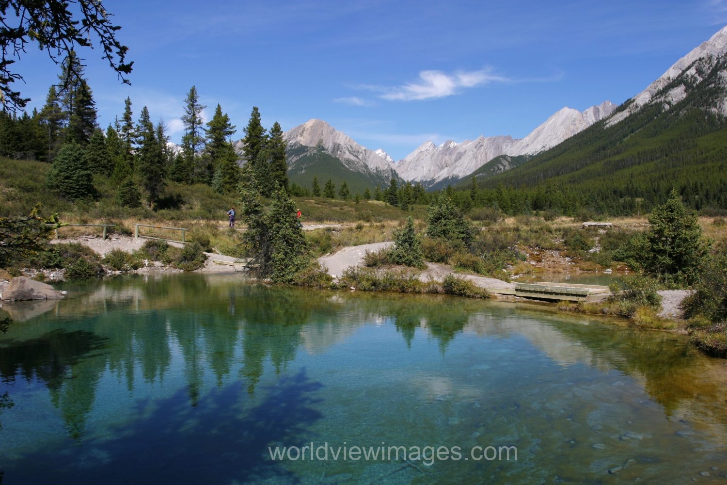 Stock Images of Lakes: Mountain Springs create colorful pond high up in the mountains in Banff National Park, in Alberta Canada