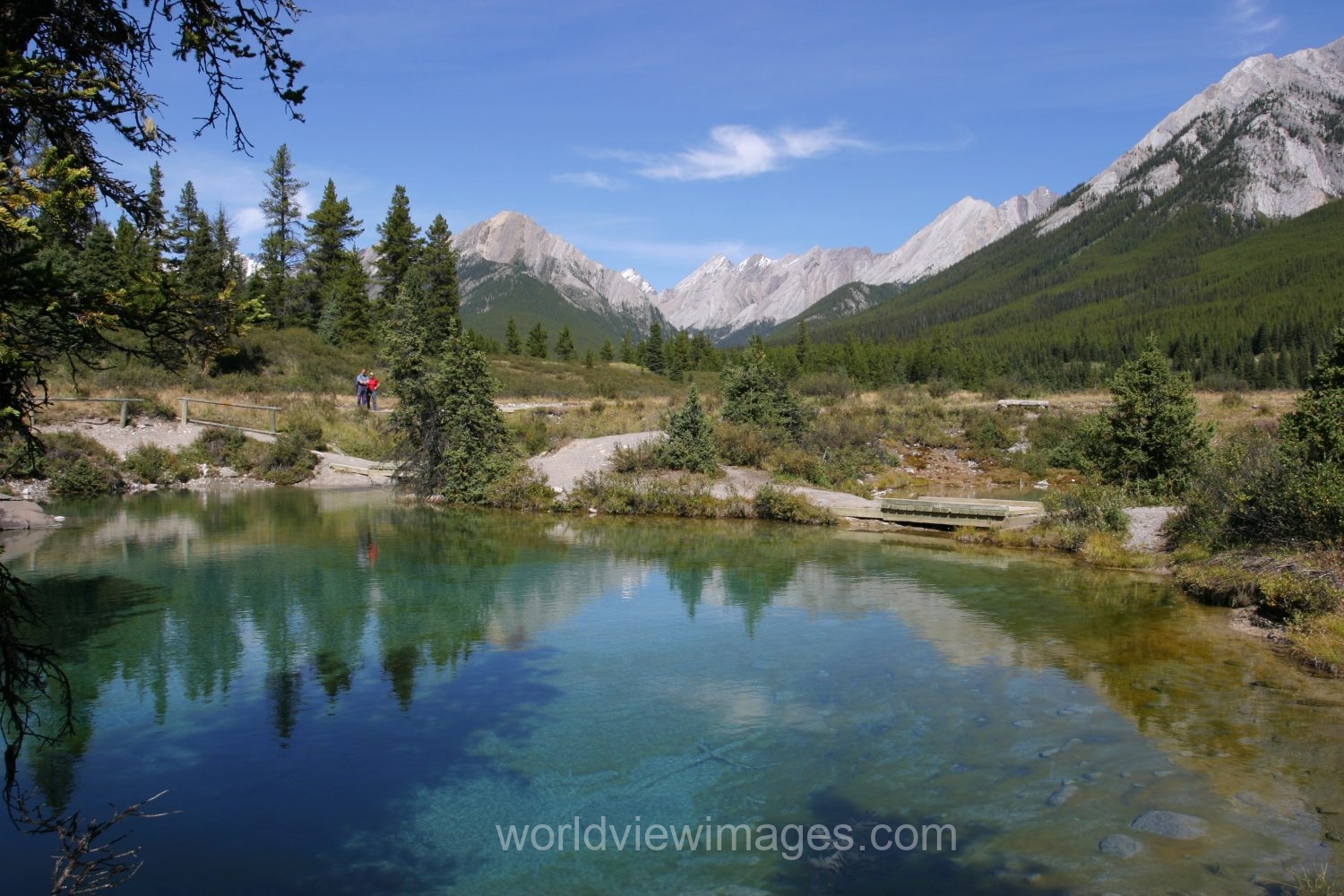 Stock Images of Lakes: Mountain Springs create colorful pond high up in the mountains in Banff National Park, in Alberta Canada